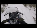 Bobcat close call on snowmobile