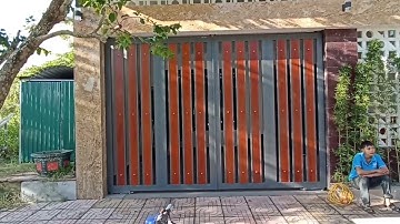 Mẫu cổng đẹp 4 cánh gỗ tự nhiên kết hợp khung sắt hộp dành cho nhà phố