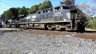 NS 4274 and NS 4177 lead a stack train east through Porter IN