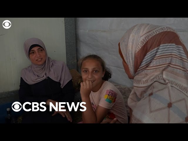 Palestinian woman says her husband and 6 of her 7 kids were killed in Gaza airstrike last year