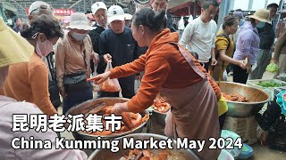 China's Kunming Railway Market, crowded with stalls covering the entire railway