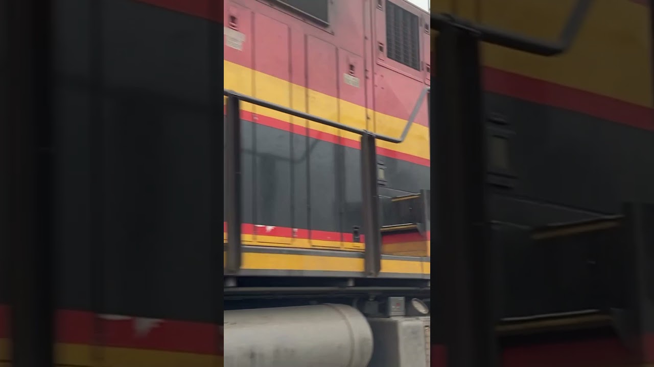 KCS ES44AC + SD70ACe leading CPKC grain train