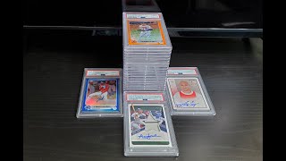 Does cracking out slabs and resubmitting them work? Find out how we did on this 20 card PSA Reveal!