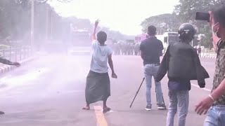 Myanmar police use water cannon to disperse protesters