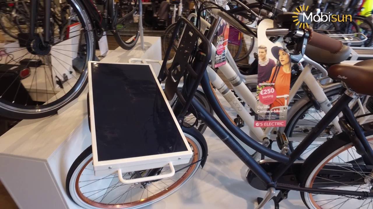 Mobisun mobiel zonnepaneel elektrische fiets op (QWIC) - YouTube