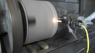 Kermetico HVAF Thermal Spray System Coating a Steel Roll
