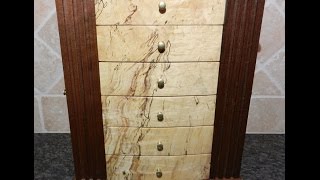 See what went into making a jewelry box. The box is made of walnut, maple and ash. The maple front is a figured piece of maple ...