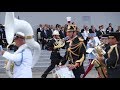 French military band plays Daft Punk medley, Trump looks bemused