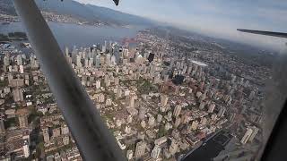 Ariel View of Downtown Vancouver in a Sea Plane. Beautiful View of NS Mountains and Stanley Park!