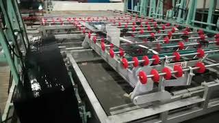 STRON glass loading and unloading machine.For double edging machine.