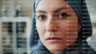 Close-Up Of Attractive Middle Easter Lady In Hijab Looking At Camera In Office