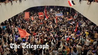 video: Watch: Iraqi protesters storm parliament in Baghdad's fortified Green Zone