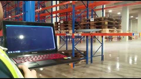 Infinium-Scan drone conducting inventory stock taking at a warehouse in Singapore