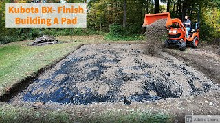 Kubota BX- Building a pad for a shed and pouring in the stone