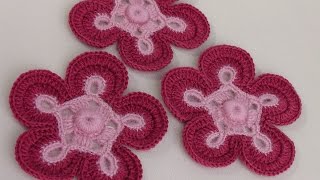 :  .  .rochet flower pattern.Knitted flower.