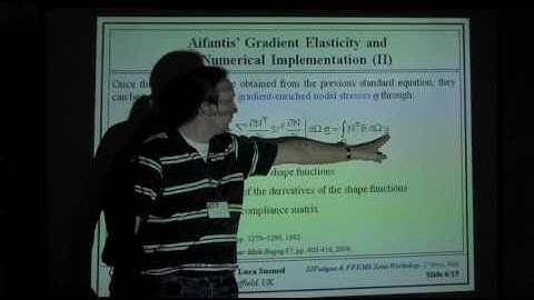 Gradient enriched linear elastic tip