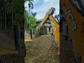 JCB is Cutting The Soil and stone together and loading it on the tractor. #shorts #ytshorts #jcb