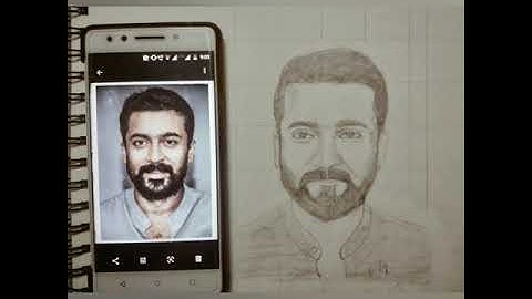 pencil sketch of actor surya using grid method