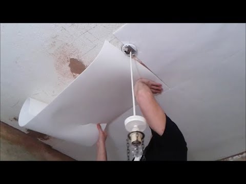 Applying Insulating Lining Paper To Ceiling