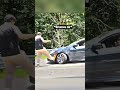 Road Raging Man Kicks Lady's Car