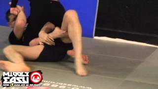 Ronda Rousey grapples Nick Diaz in the 209
