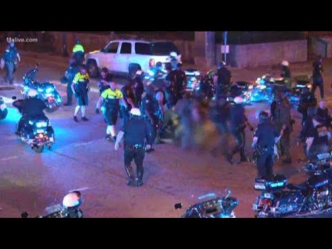 Atlanta motorcycle officer recovering after being struck by ATV - YouTube