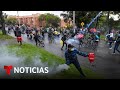 Al menos 13 muertos en las protestas que arrasan a Colombia | Noticias Telemundo
