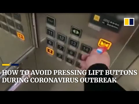 People in China use toothpicks and lighters to avoid pressing lift buttons amid coronavirus outbreak