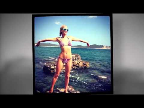Download Paris Hilton Flaunts Her Figure in a Zebra Print Bikini in Ibiza