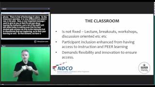 Short clip showing the Auslan interpreter, live captions and presentation