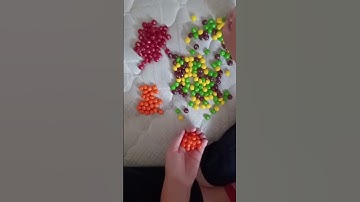 Sorting Skittles (with Skittle sounds put over it) #Skittles #odlysatisfying