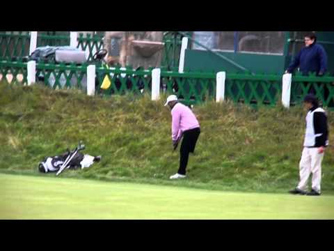 Inspirational one legged golfer, Manuel De Los Santos, playing the 18th hole on the Old Course at St Andrews. He has amazing balance, and a handicap of only 3. He lost his leg in an accident aged 18, now 26, playing in the pro-am Alfred Dunhill Links Championship, 19 October 2010. Originally from the Dominican Republic, he now lives in Paris.