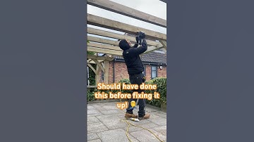 Routering pergola beams above my head after putting them up was not my best idea😂ended up covered!