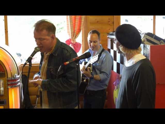 Edwyn Collins, Tim Burgess and Roddy Frame at Kendal Calling 2012 play A Girl Like You. class=