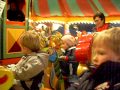 Oskar and Charlie loving the merry-go-round - Teletext Holidays TV Star Competition