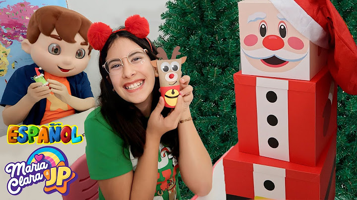 Maria Clara y JP decoran el árbol de Navidad de la escuela