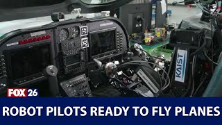Robot pilots ready to fly planes screenshot 5