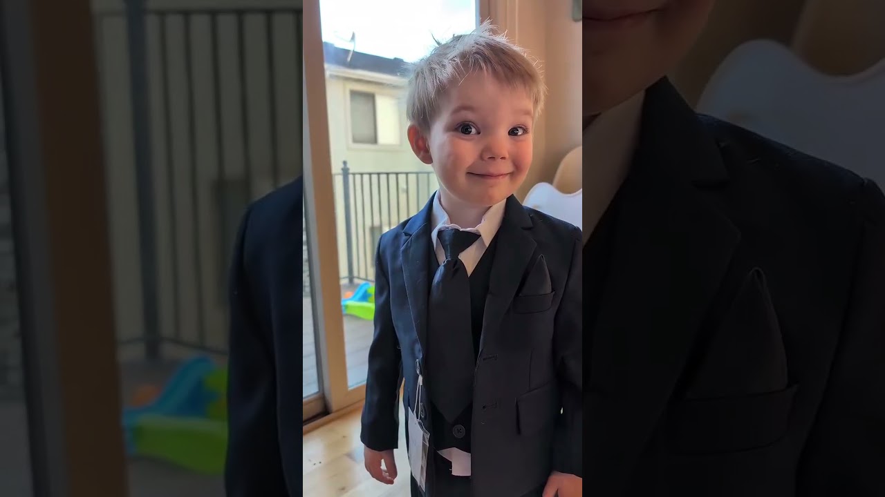 Adorable twin boys wore stunning suits to their brother's baby blessing! How cute are these??!
