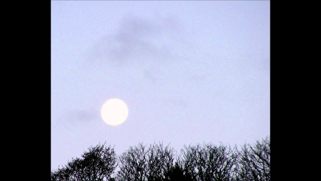 a solitary moon floats - YouTube