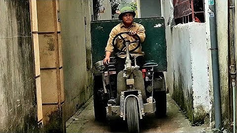 Máy xúc nhỏ gọn múc đất lên công nông ba bánh