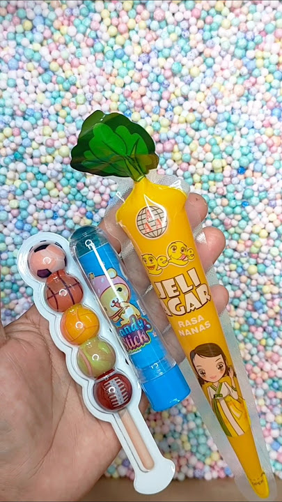 hunting lolipop 🍭🍓 candy 🍬 in styrofoam granules #reversevideos_ #candy #shortvideo #fypシ゚viral