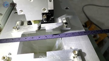 Coating machine for coating silicone dot on narrow belt