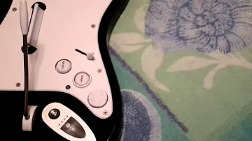 Does PS3 Rock Band guitar need dongle?