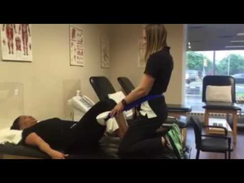 Traction on the lumbar spine using a Mulligan belt - YouTube
