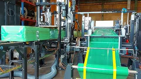 Packaging machine for rigid foam insulation panels