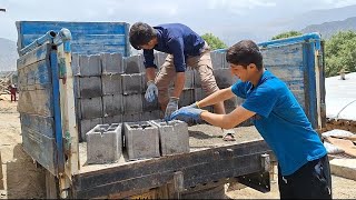 Nomadic life: Burhan brings blocks to the neighbor with a heavy car