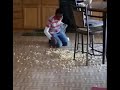 Kid drops popcorn