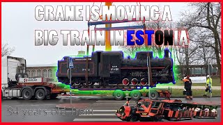 CRANE MOVING 72 YEARS OLD BIG TRAIN IN ESTONIA