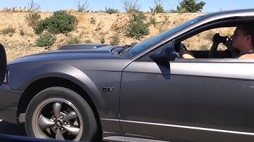 mustang gt vs dodge charger daytona 30 roll