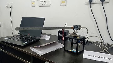 Adaptive controller on flexible robot arm